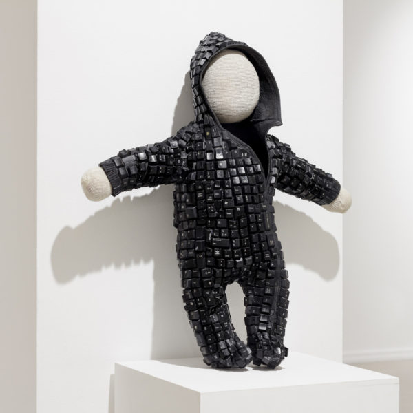 BABY BOOM 1, 2018, Computer keys, fiberglass and resin, knit crochet thread, net, wire and found objects, 64 x 15 x 55 cm.